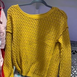 mustard colored sweater